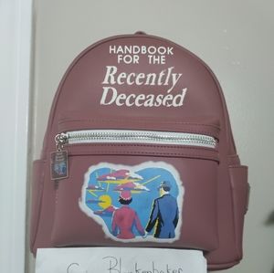 Loungefly Beetlejuice handbook for the recently deceased mini backpack.
